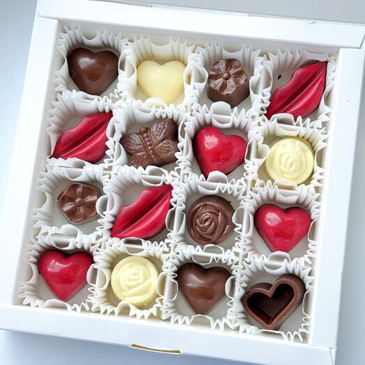 Chocolates praliny hearts and flowers