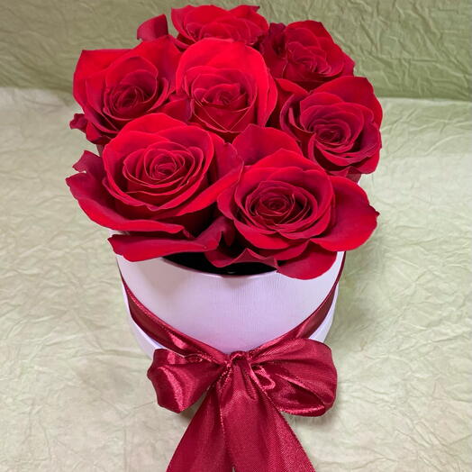 7 stems of roses in box