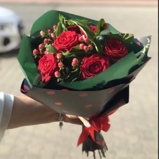 Red roses with hypericum