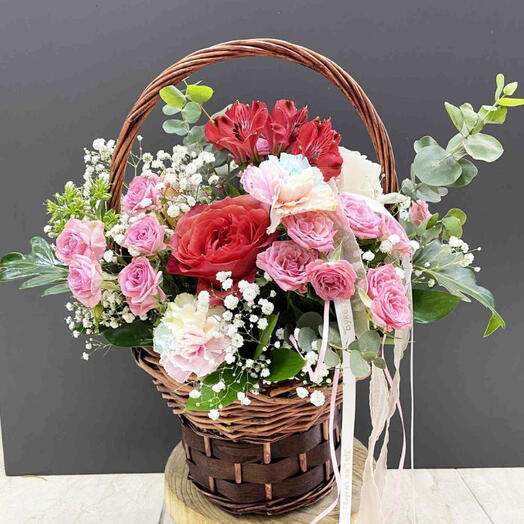 Romantic flower basket with roses and spray roses