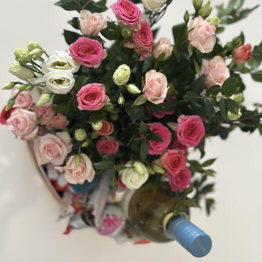 Wine , candies and roses