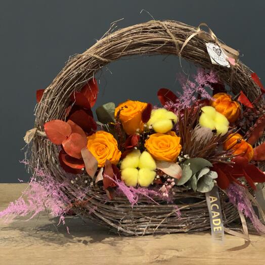 Basket with orange roses