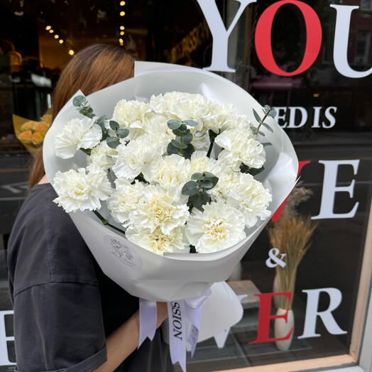 White Dianthuses with eucalyptus
