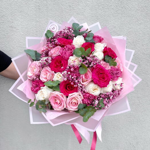 Mix roses bouquet with gypsophila and eucalyptus
