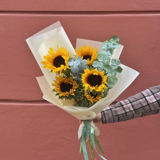 Bouquet of sunflowers with eucalyptus