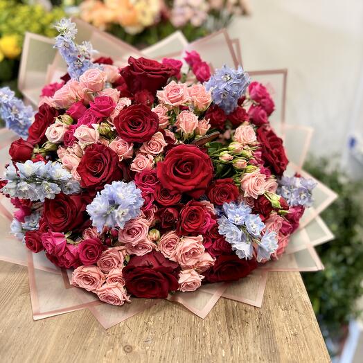 Extra roses flower boquet with blue delphinium