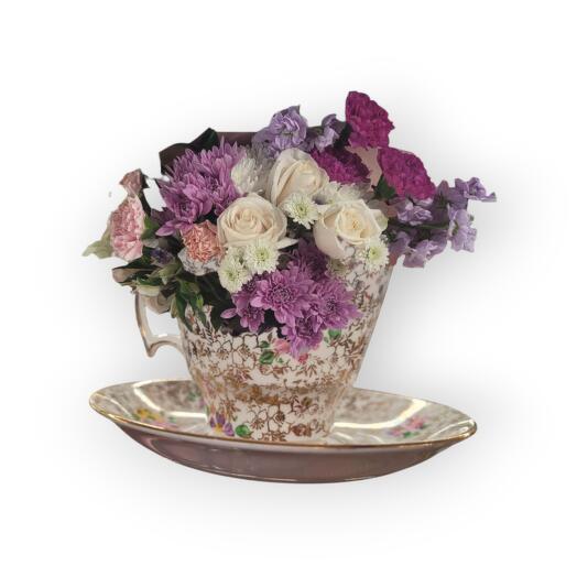 Beatrice arangment,  flowers in vintage cup and soucer