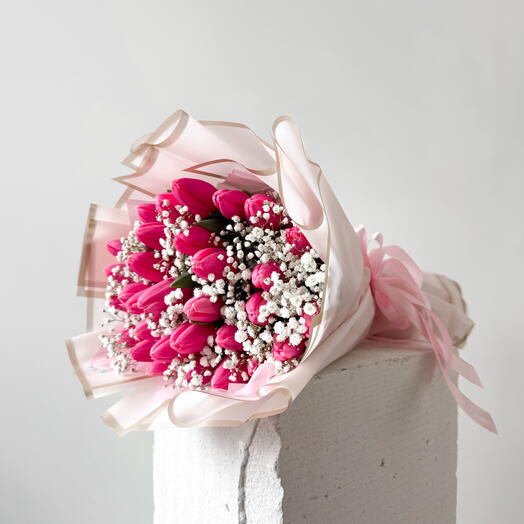 Pink tulips with white gypsophila bouquet