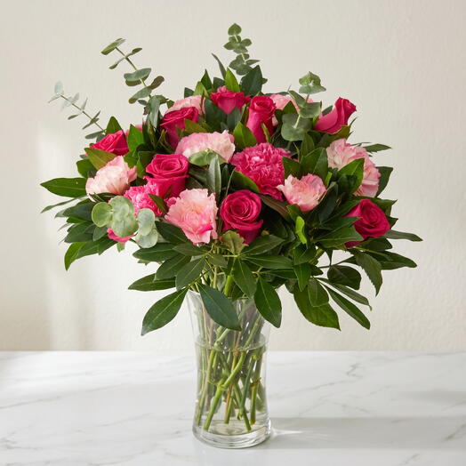 Rosas fiucsa y claveles