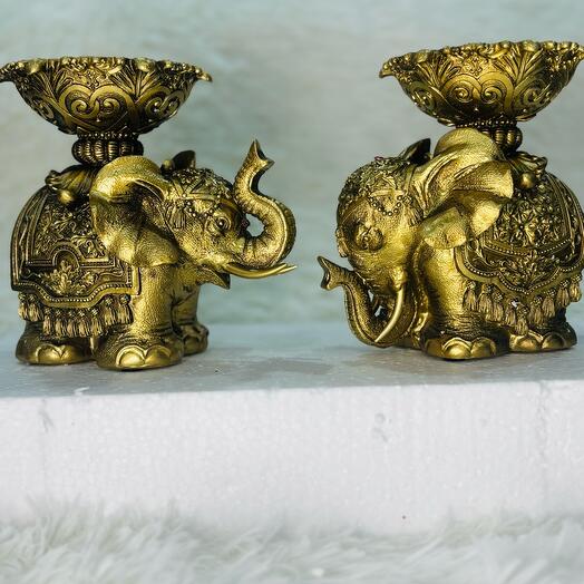 Beautiful artwork elephant candle holders pair to make your jome more beautiful