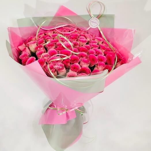 Designer bouquet of 51 hot pink roses in a festive package