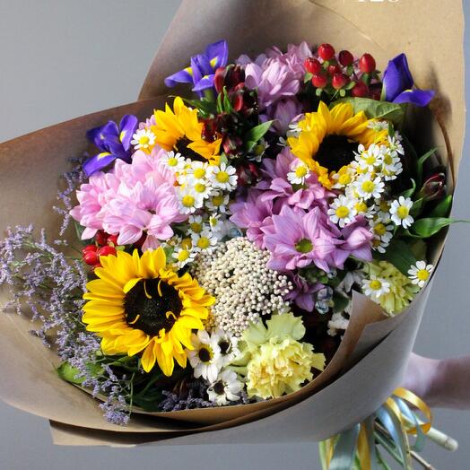 Field with sunflowers, mams and daisies