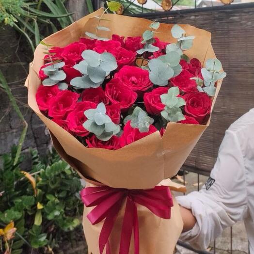 31 roses with eucalyptus