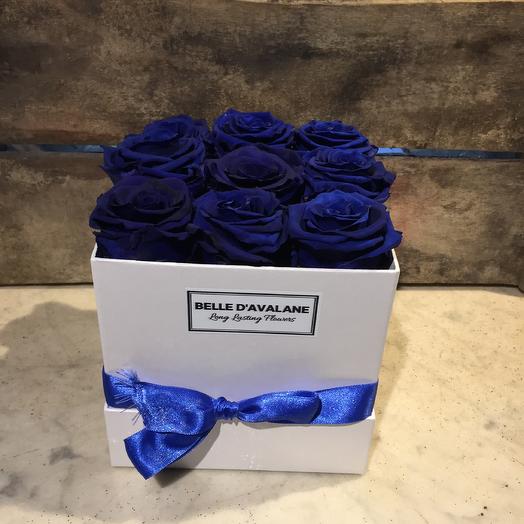 Blue stabilized roses in a box
